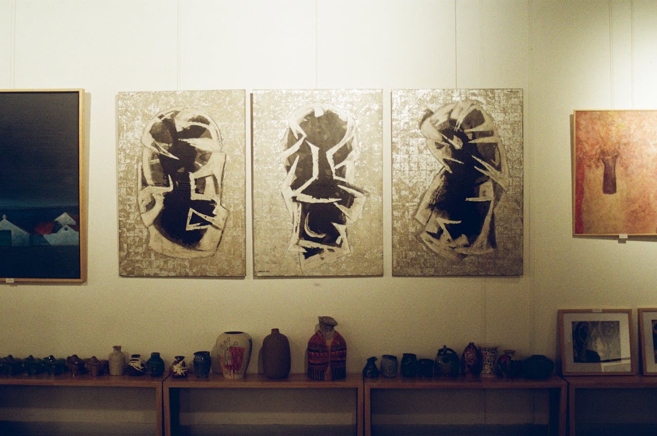 Explore a modern art exhibit featuring abstract and cultural artworks in Ho Chi Minh City, Vietnam.